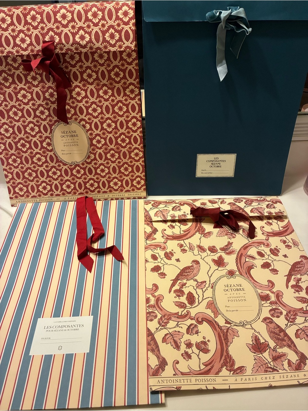 Sezane patterned gift bag set in cream, red, blue and teal